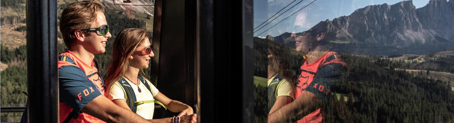 Two people in the cable car