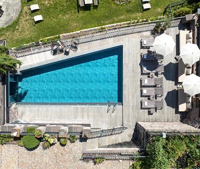 The outdoor pool seen from above in summer