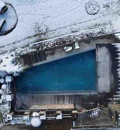 The outdoor pool seen from above in winter