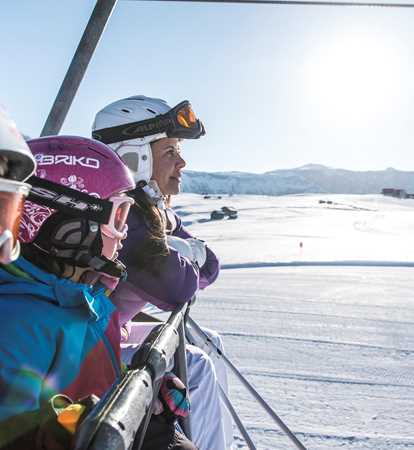 Family in a ski lift